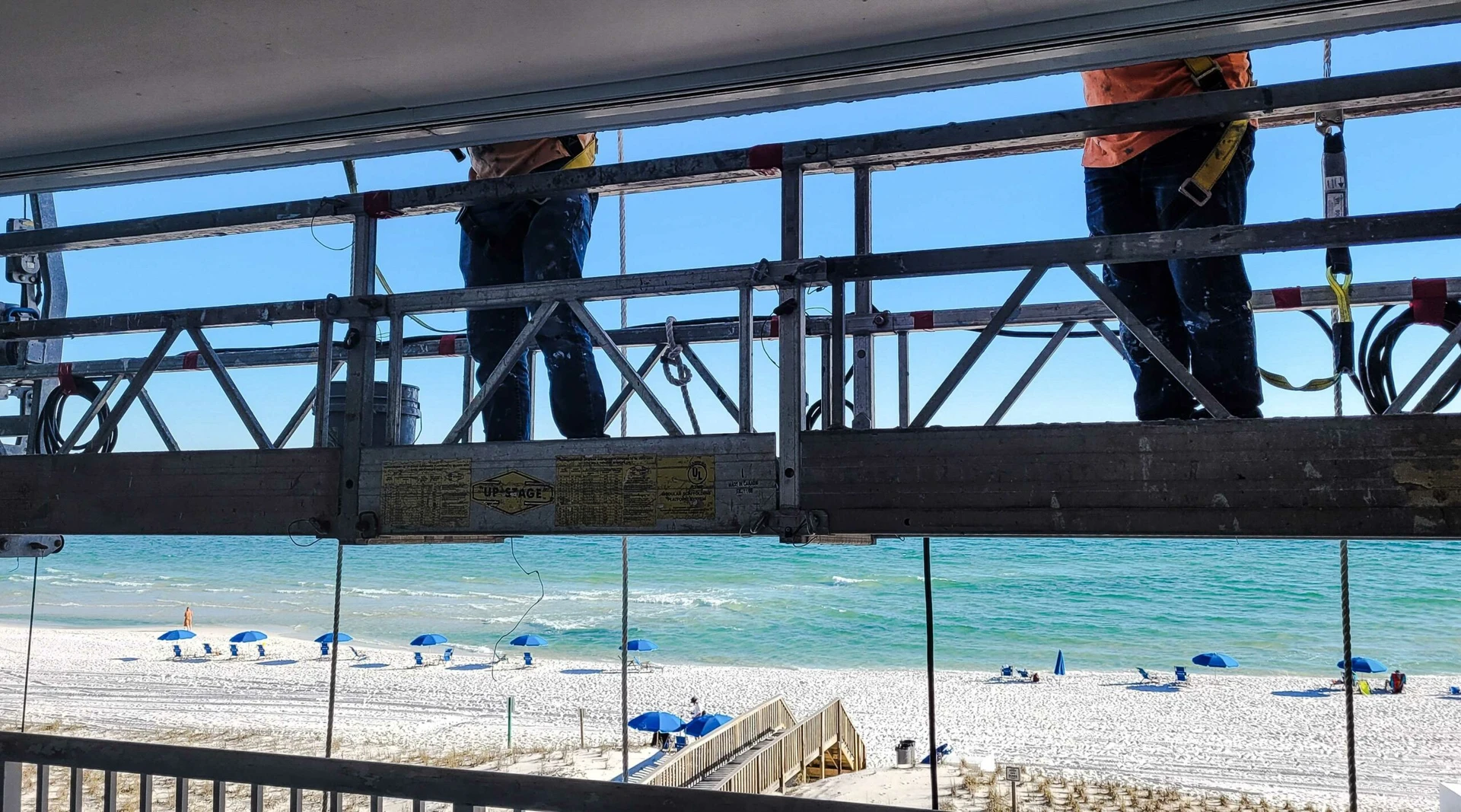 72019-two-workers-painting-the-outside-of-a-condo-buildi-2022-11-12-10-43-12-utc-(1) California Commercial Painting