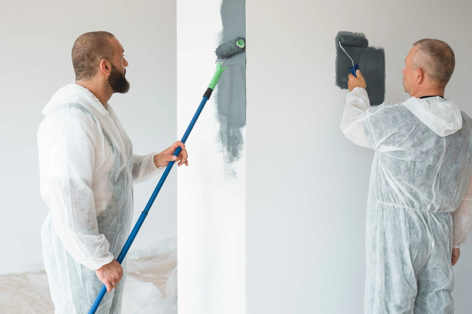 896443-professional-renovation-crew-painting-walls-of-new-2021-08-27-14-49-15-utc-scaled Duxbury Painting Company
