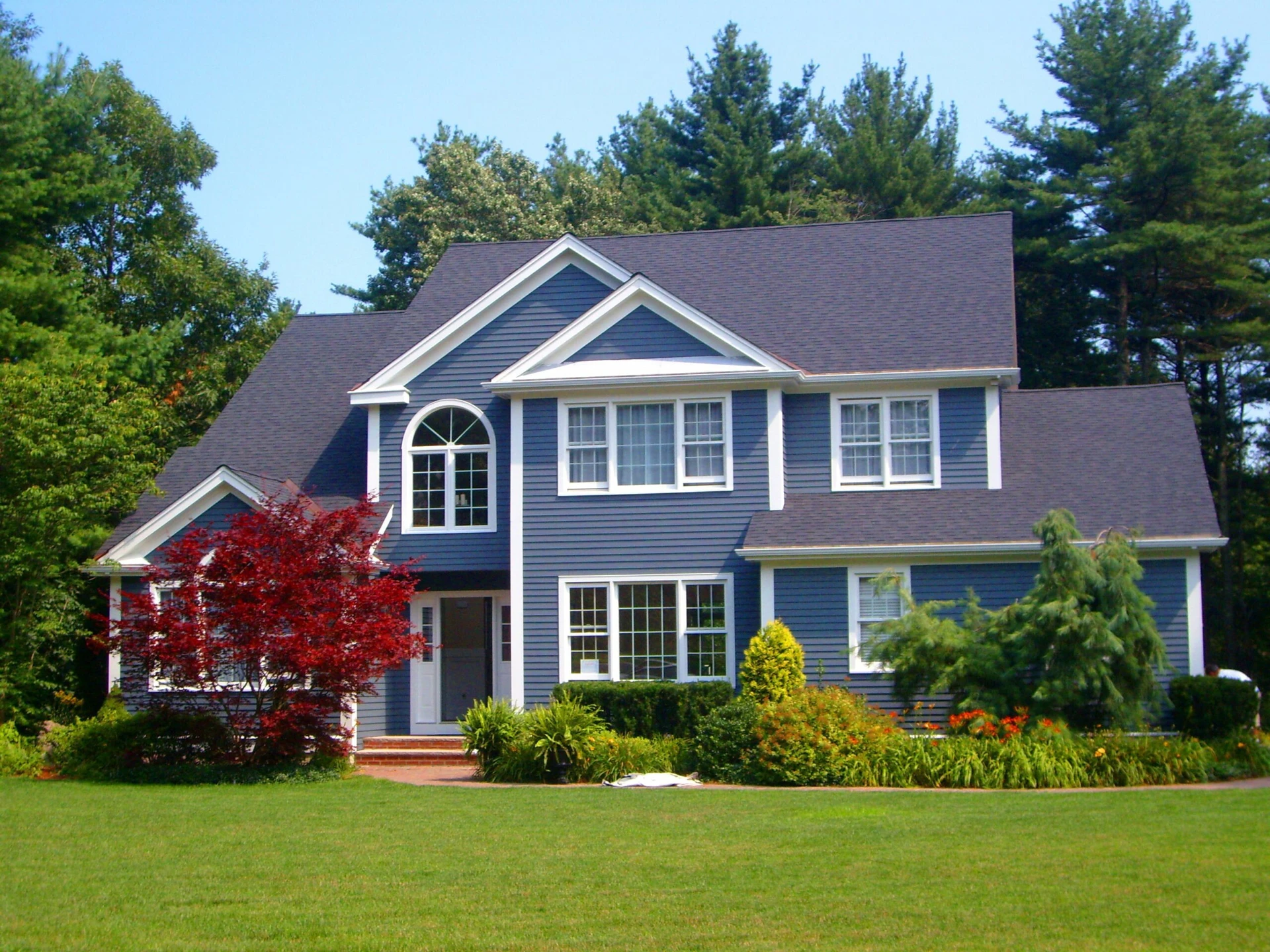 Arch-Res-Ext-NorthReadingMA-1-After-min Residential Painting: The house is blue.